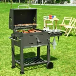 BIGZZIA Barbecue Grill - Barbecue Charbon De Bois à 2 Roues 2 Grilles Et 1 Thermomètre En Métal - Barbecue Au Charbon De Bois Avec Tablette Latérale Et Crochet Pour La Cuisine En Extérieur